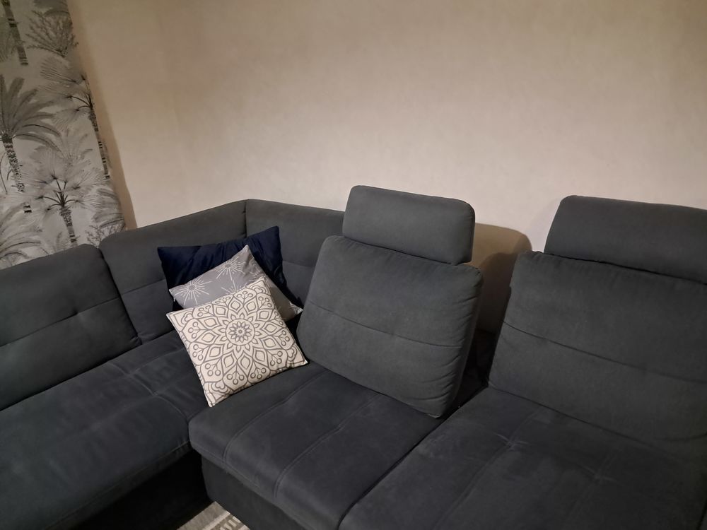 Canap&eacute; d'angle gris avec assises r&eacute;glables Meubles