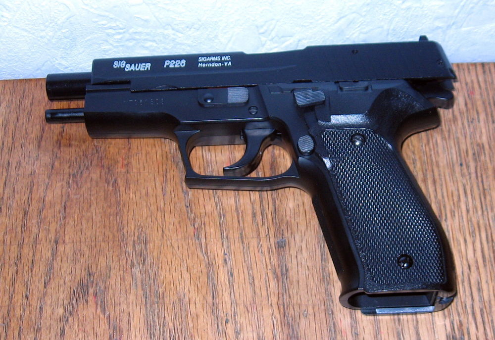 &eacute;change Sig Sauer P226. 