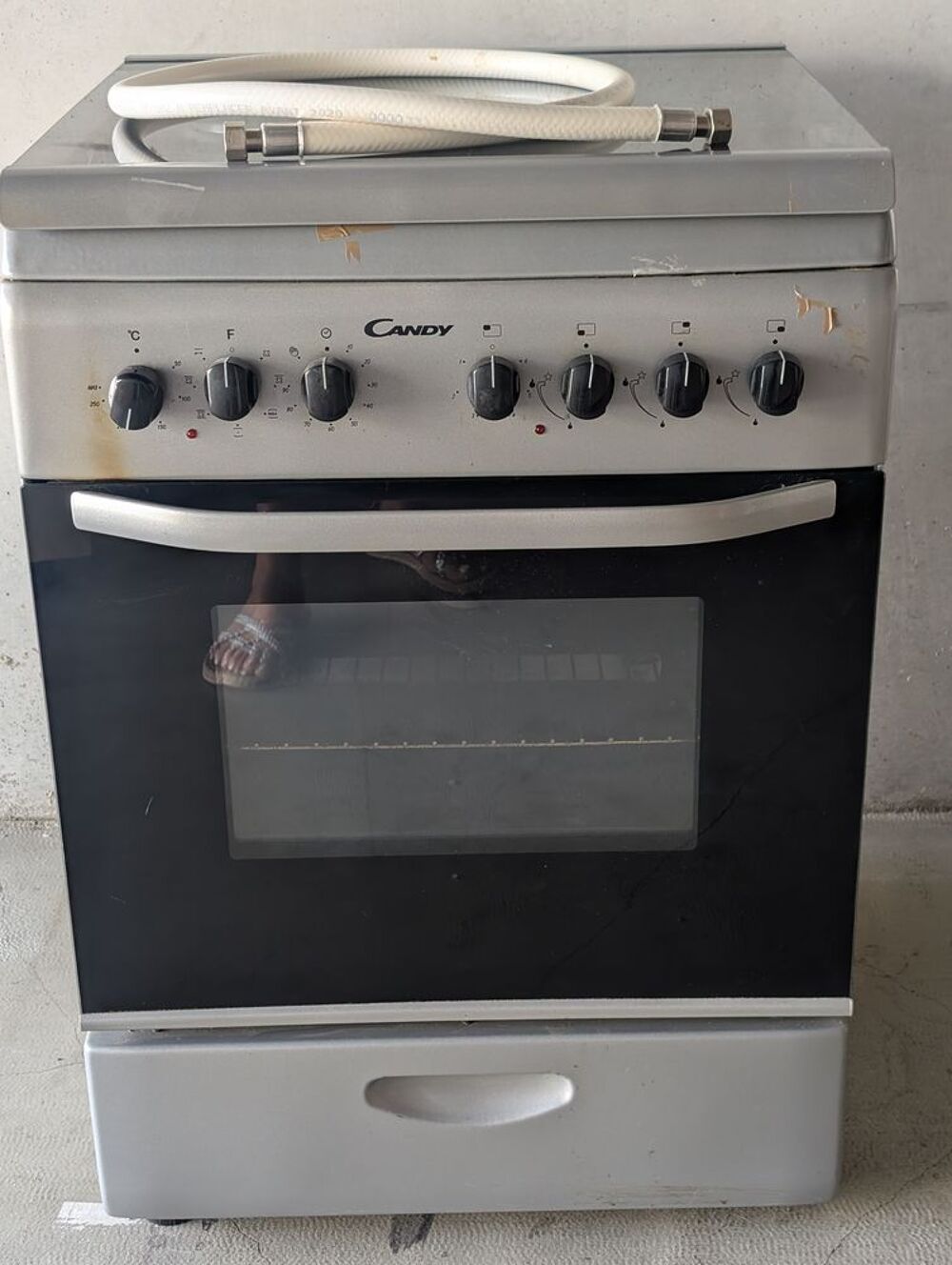 Cuisini&egrave;re mixte (gaz et &eacute;lectrique) de marque Candy Electroménager
