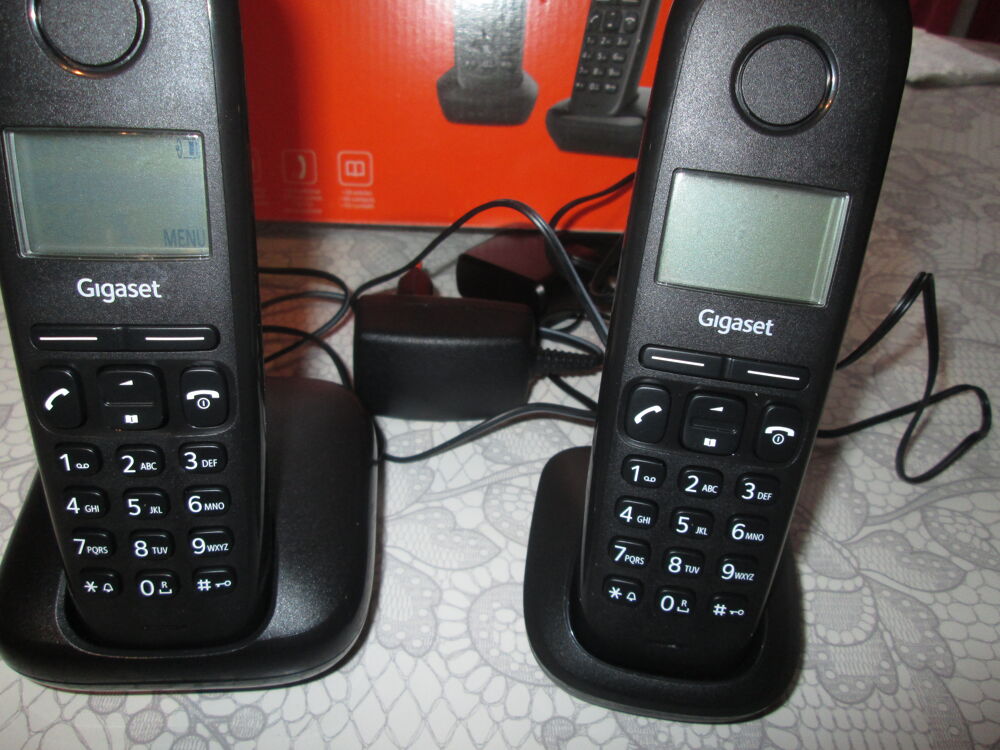 t&eacute;l&eacute;phone fix noir sans fil cause double emploi Tlphones et tablettes