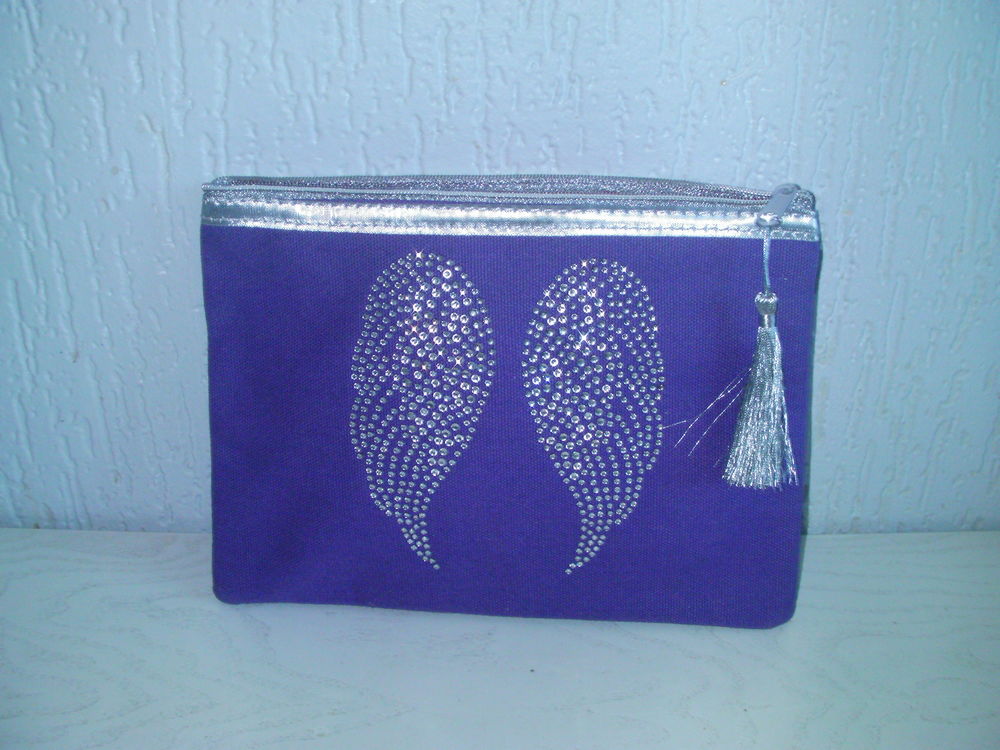 PETITE POCHETTE couleur mauve Maroquinerie