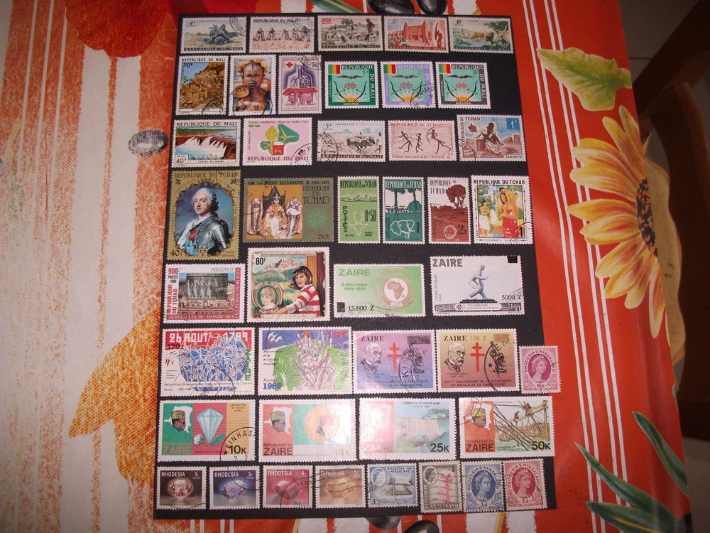 Lot de 200 timbres diff&eacute;rents et oblit&eacute;r&eacute;s d'Afrique (1).
l 