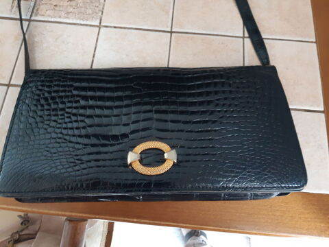 Sac pochette en crocodile 0 Antibes (06)