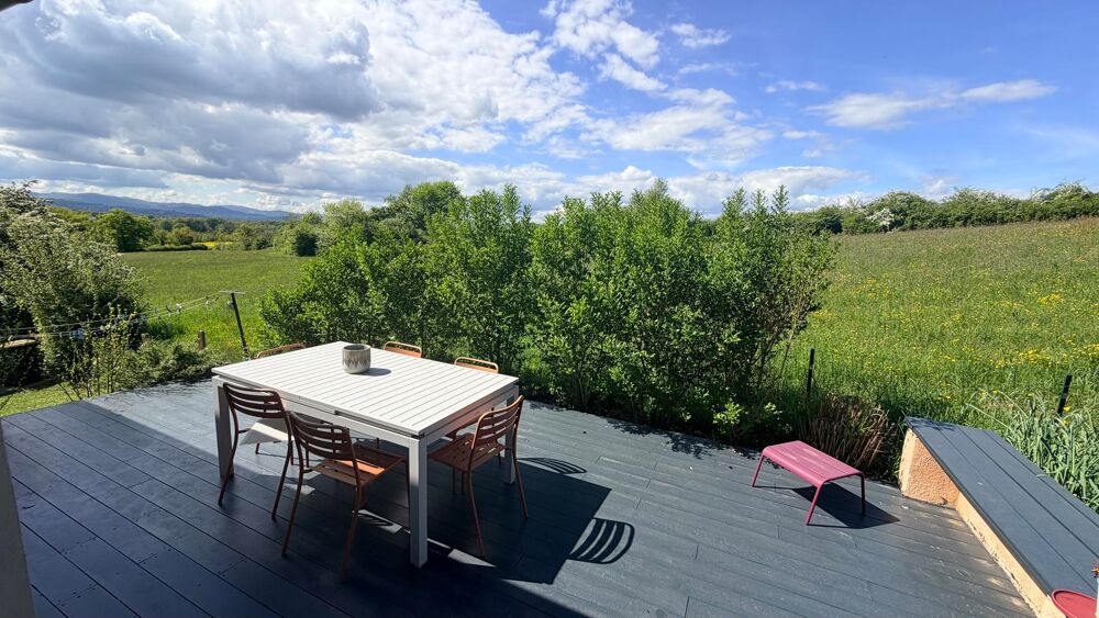Sur les hauteurs de Dommartin, Belle villa familiale en....