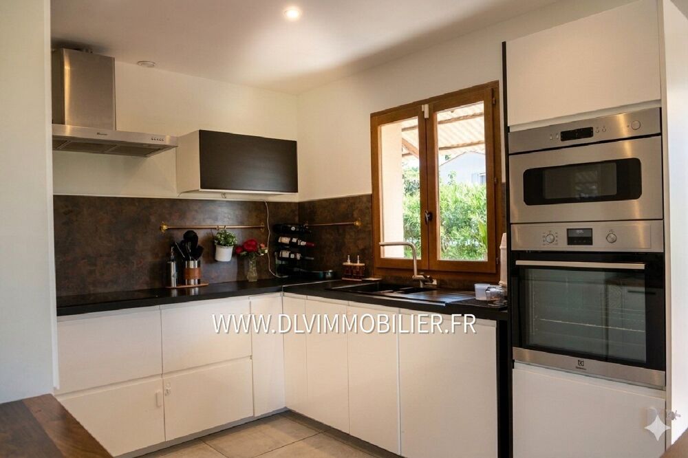 Maison plain-pied 106 m², 3 ch + garage + cave