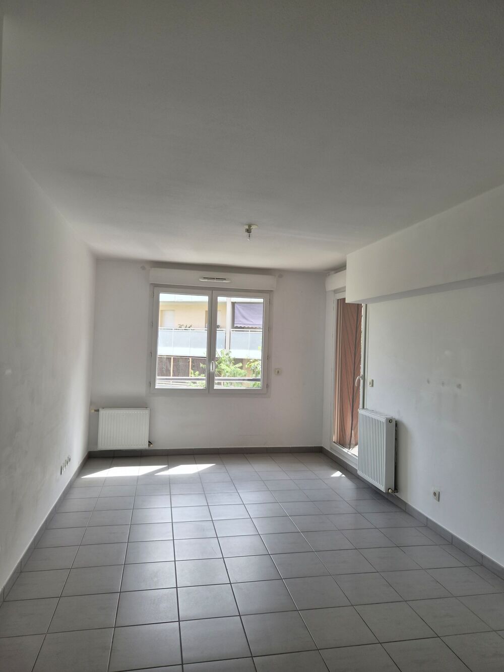 Vente Appartement T2 avec balcon et parking en sous sol - Résidence récente Villeurbanne