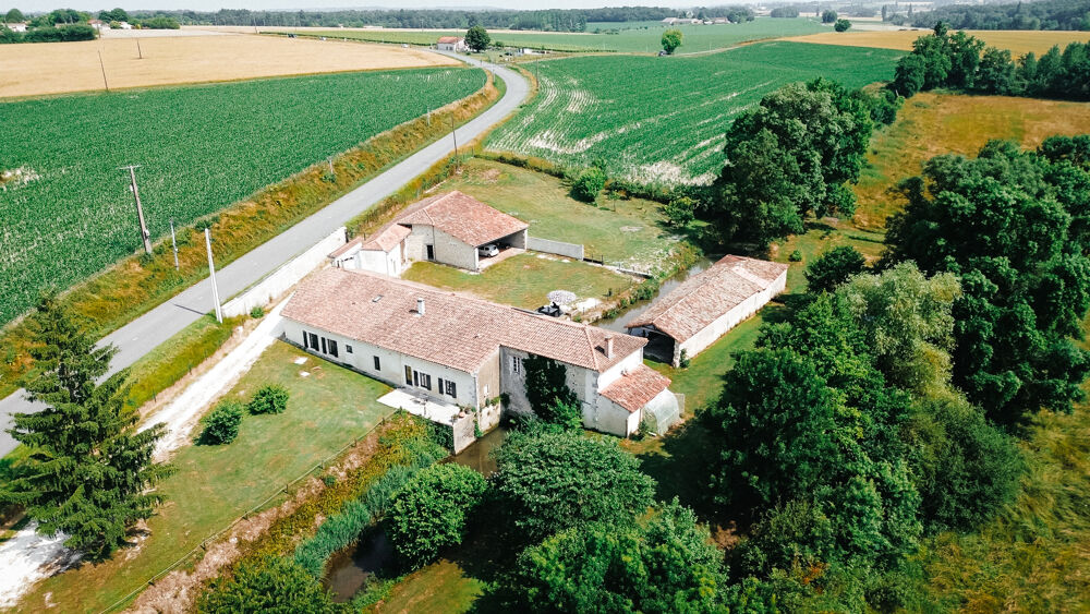 PROPRIETE AVEC BELLE DEMEURE RENOVEE ET MOULIN EN ACTIVITE