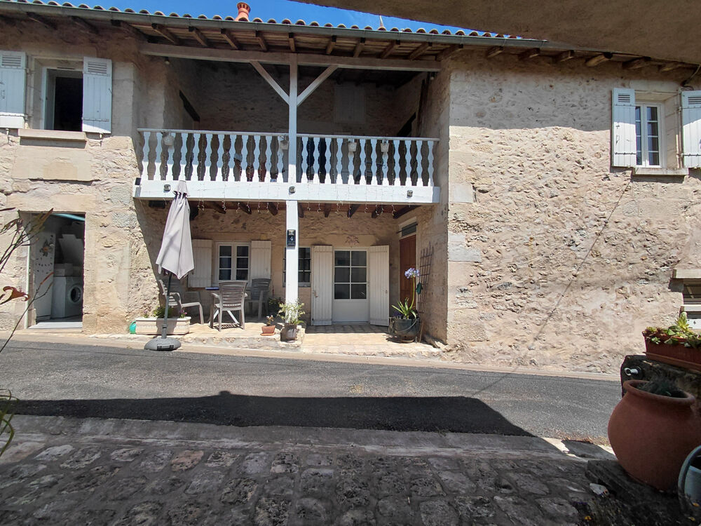 Proche du Château, Maison en pierre à Château l'Evêque