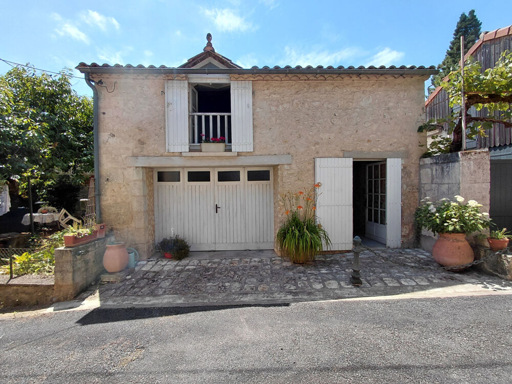 Proche du Château, Maison en pierre à Château l'Evêque