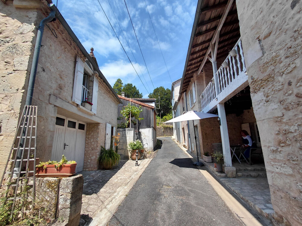 Proche du Château, Maison en pierre à Château l'Evêque
