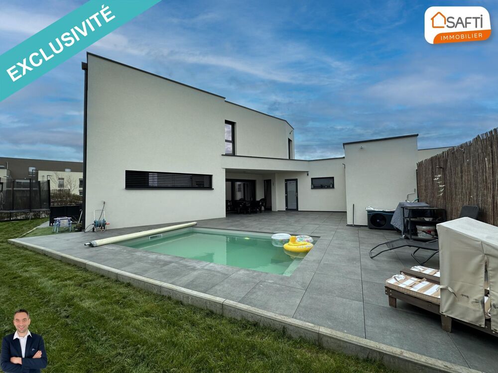 Vente Maison Superbe maison moderne de 5 pices disposant d'un jardin, d'une piscine, d'une grande terrasse et d'un garage ! Marckolsheim