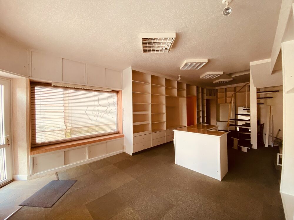   Immeuble de rapport Appt T2 + Grenier + 2 caves Gramat