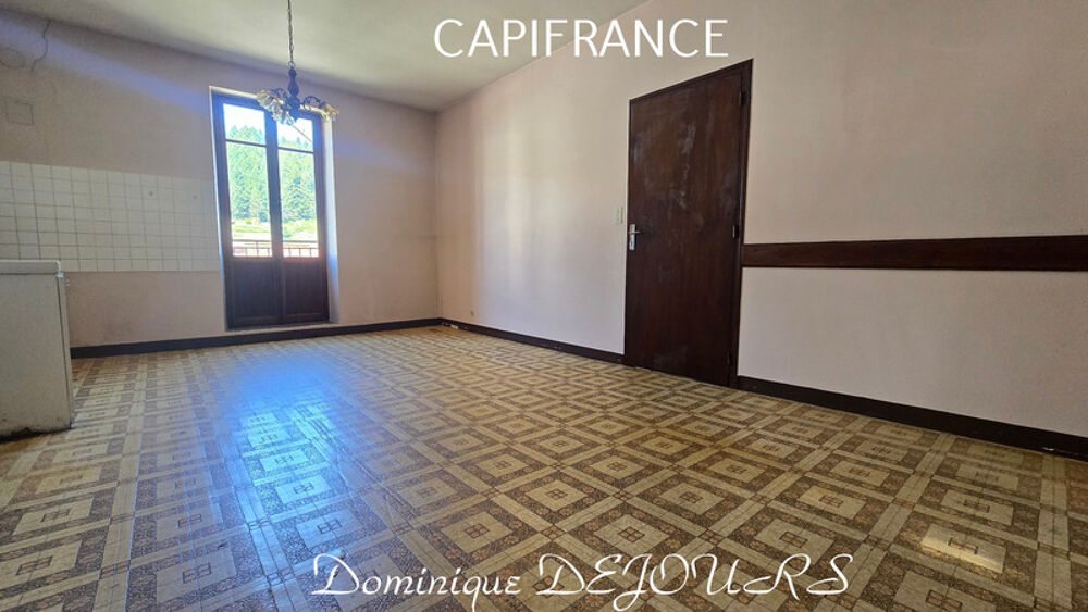 Maison composée de 2 appartements (57 et 43m²) et d'un grand garage de 100m²