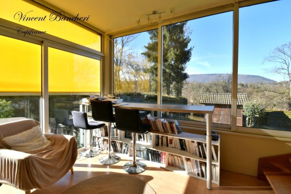 Maison familiale d'environ 160 m² avec piscine, 5 chambres et terrain de plus de 1160 m² au coeur d'un secteur prisé de Reignier