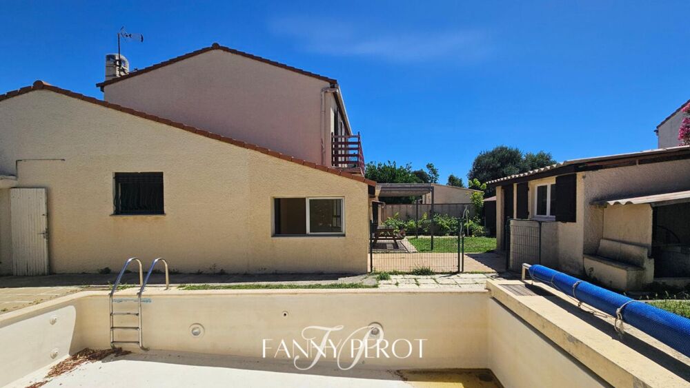 Maison 3 faces de plus de 100m² sur 440m² de terrain avec piscine