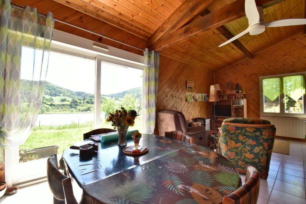 Maison à ossature bois avec vue panoramique, terrain de 1 077 m² et vaste carport