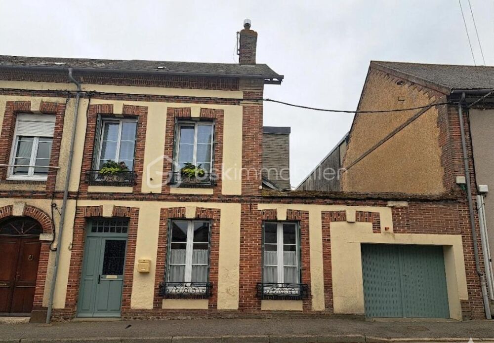 Maison de village avec jardin clos et garage