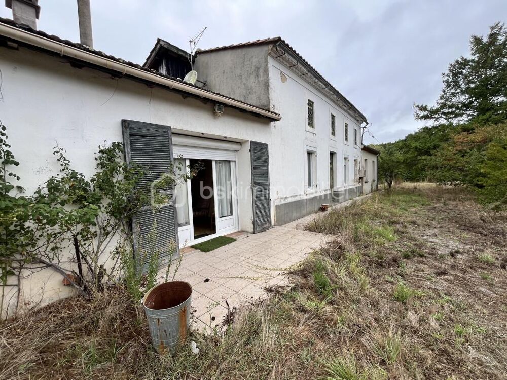 Batisse en pierres avec grange à rénover