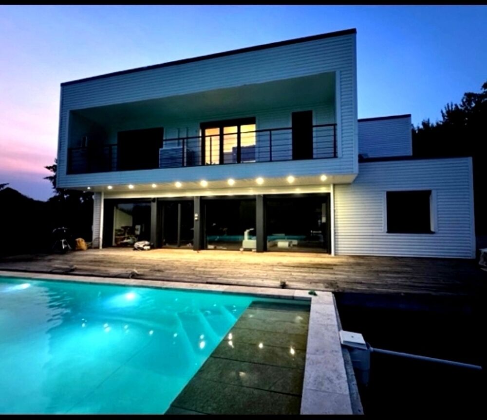Maison passive 4 Chambres avec Piscine Chauffée, Étang et Performances Écologiques
