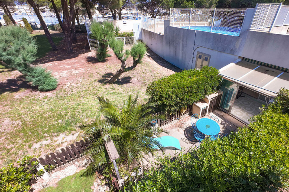 Appartement rez de jardin à Port Camargue - Résidence avec piscine
