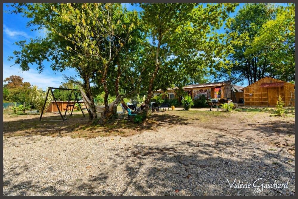 Vente Chalet MENESPLET (24) Chalet bois avec dépendance, piscine et grand terrain clos proche Montpon-Ménestérol Menesplet