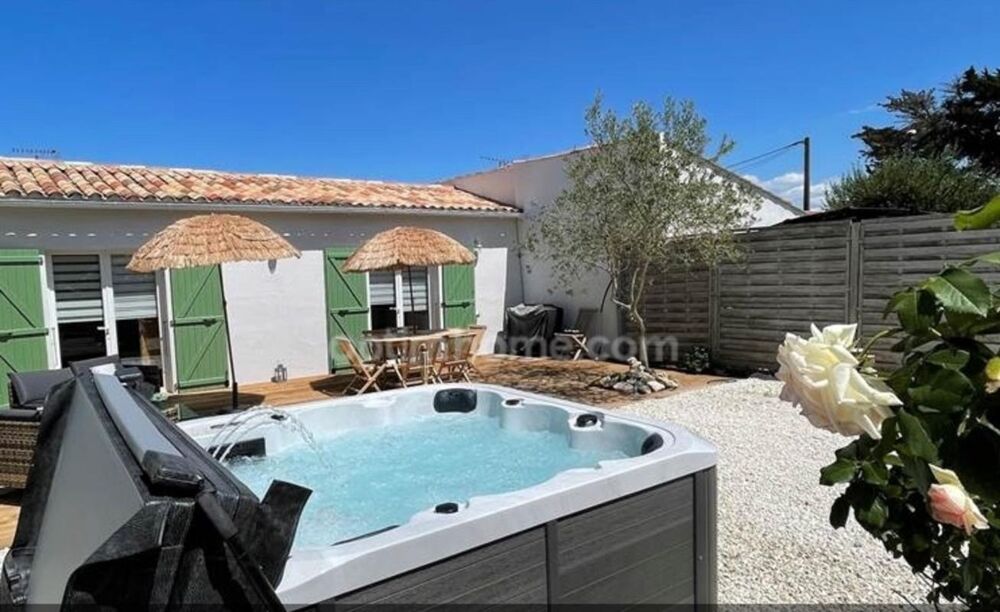 EXCLUSIVITÉ  RARE SUR LE MARCHÉ : ENSEMBLE IMMOBILIER DE 2 MAISONS INDÉPENDANTES AVEC SPAS ET PARKING PRIVATIF
