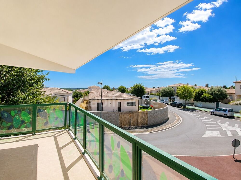 Appartement T4 de standing avec terrasse, climatisation, garage et aperçu mer