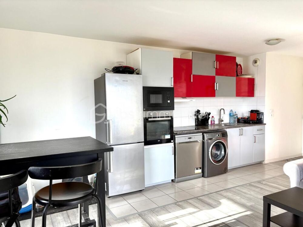 Appartement F4 avec balcon et 2 places de parkings en sous sol
