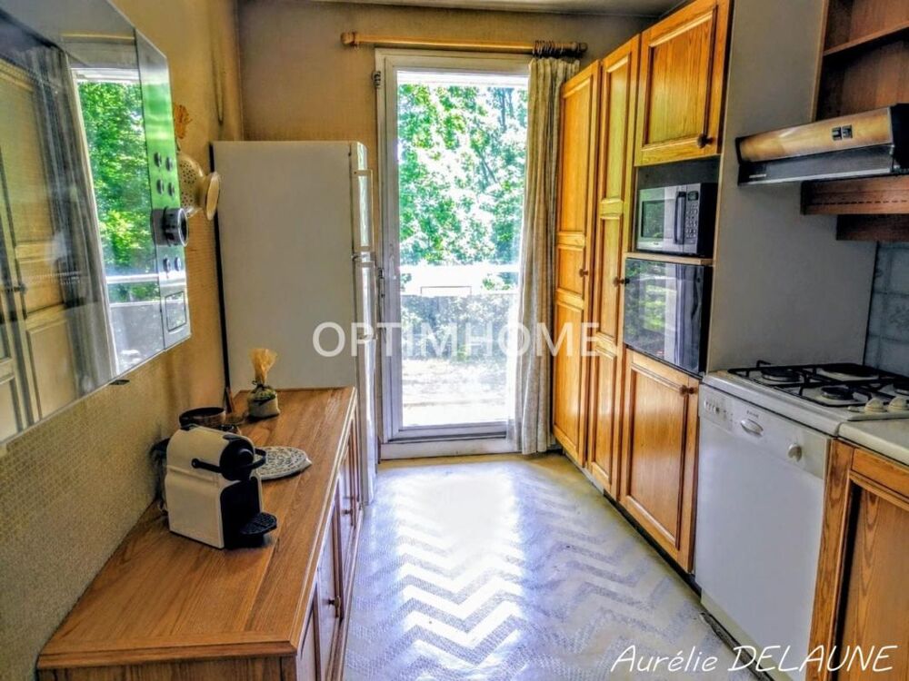 Appartement 92m2 - T4 - 2 chambres - Balcon - Cave - Box - Proche centre-ville et gare RER D