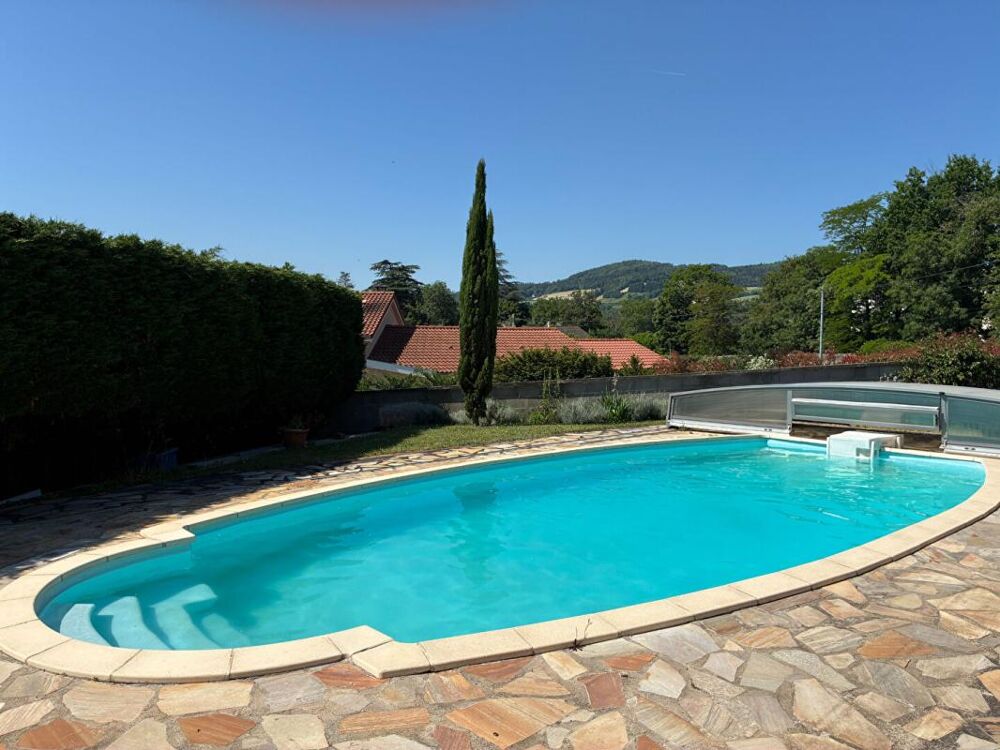 Unieux 42240 maison individuelle des années 70 sur sous sol complet 131m² habitables 4 chambres 3 garages 1 piscine sur 1190m² d