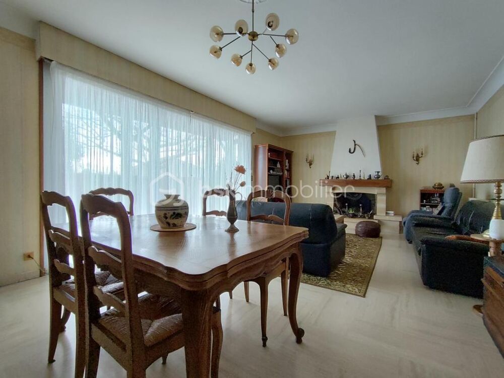 Maison individuelle avec terrain, garage et quatre chambres