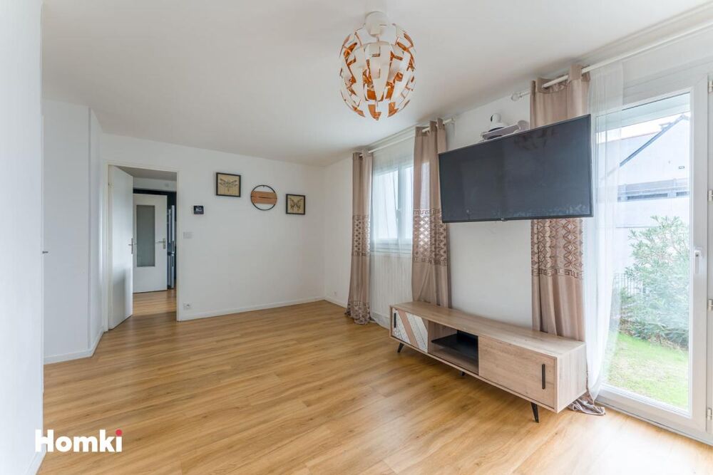 Appartement T4 avec jardin privatif de 58 m²  Un esprit maison à deux pas du centre