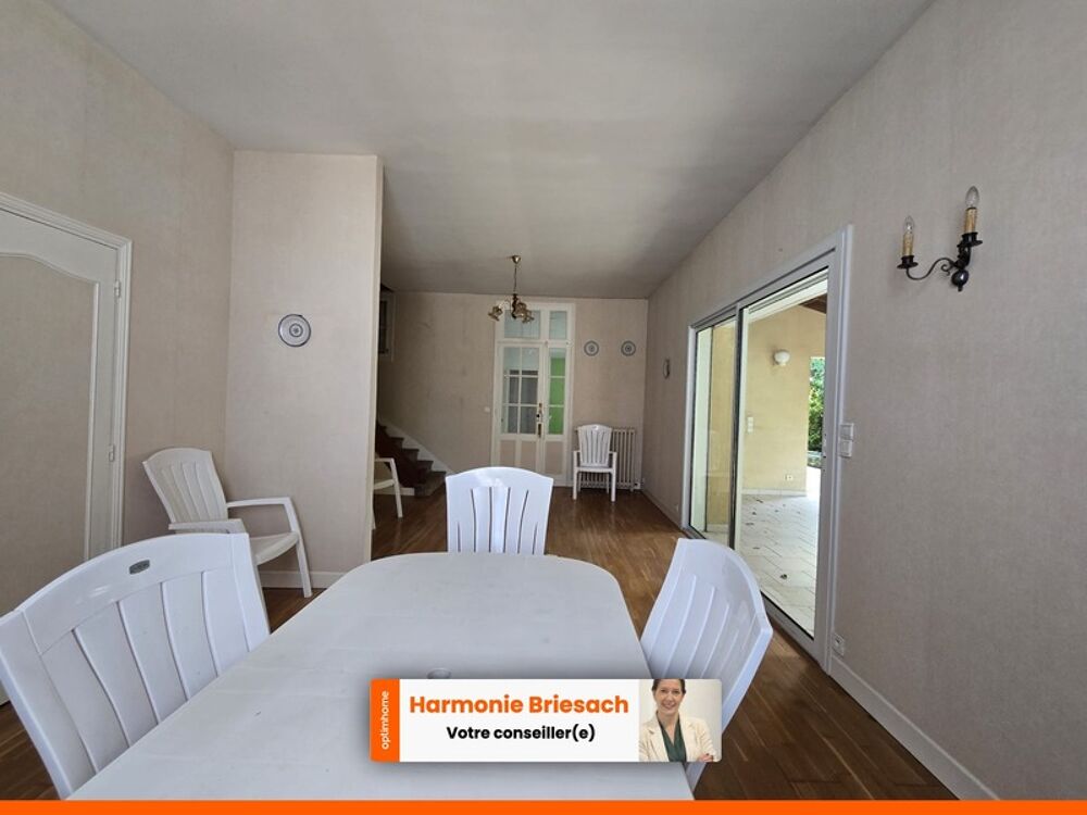 Maison familiale avec grand jardin, terrasse couverte et garage