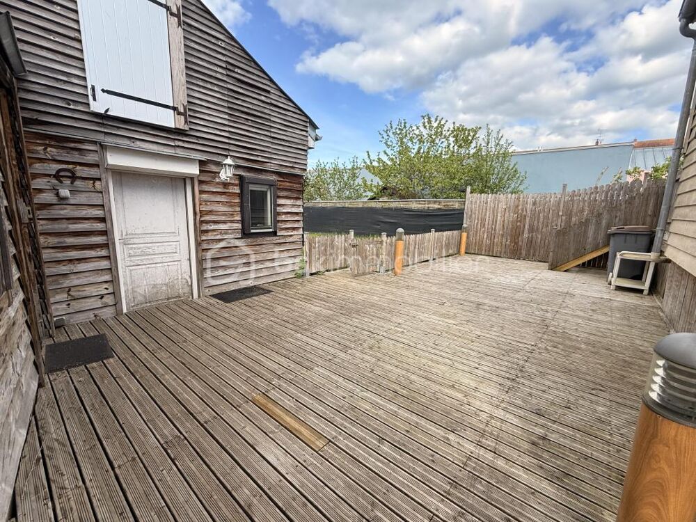 Maison familiale de 103 m² avec 4 chambres, jardin clos et sous-sol complet