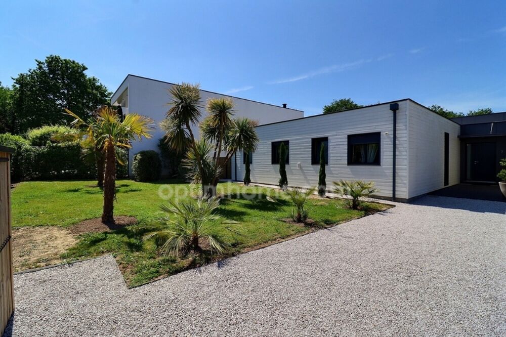 ORVAULT "LA FORÊT"  Prestigieuse villa d'architecte de plain-pied (197 m²) avec piscine dans un écrin de verdure