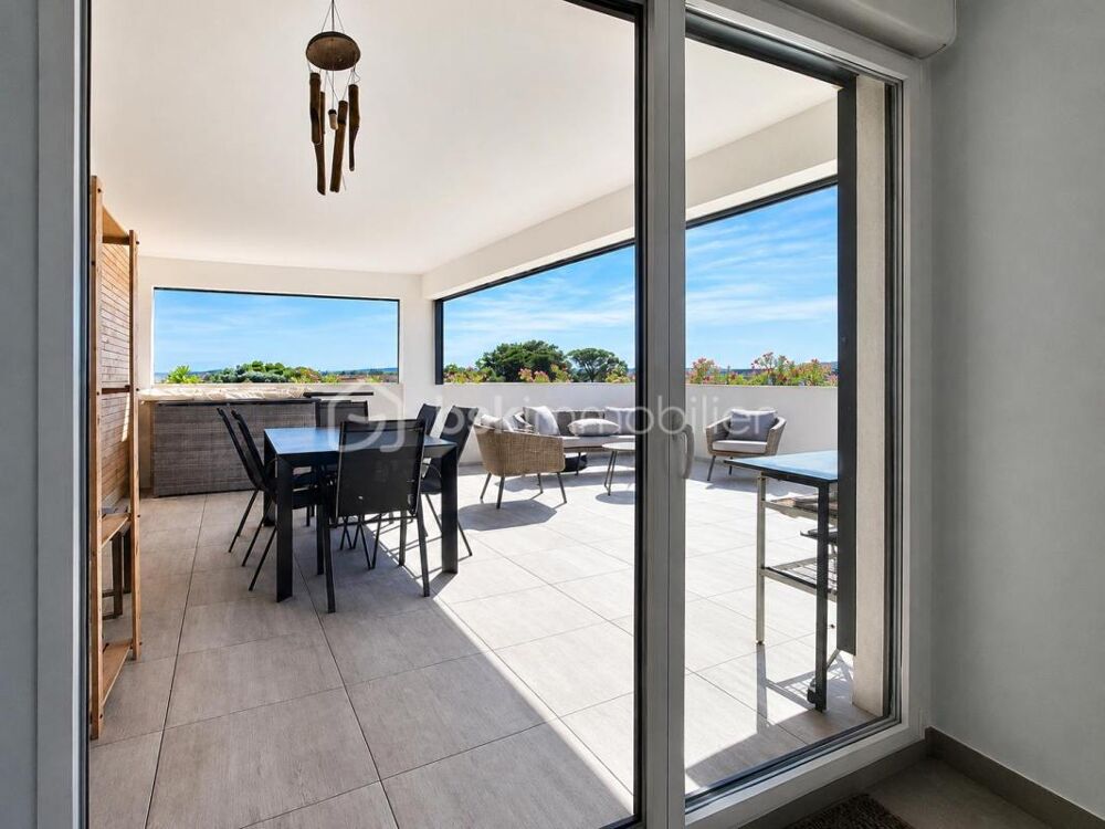 DERNIER ÉTAGE  DUPLEX 113 m²  TERRASSE 43 m² SANS VIS-À-VIS  VUE MER & CANIGOU  PISCINE  500 M DE LA PLAGE