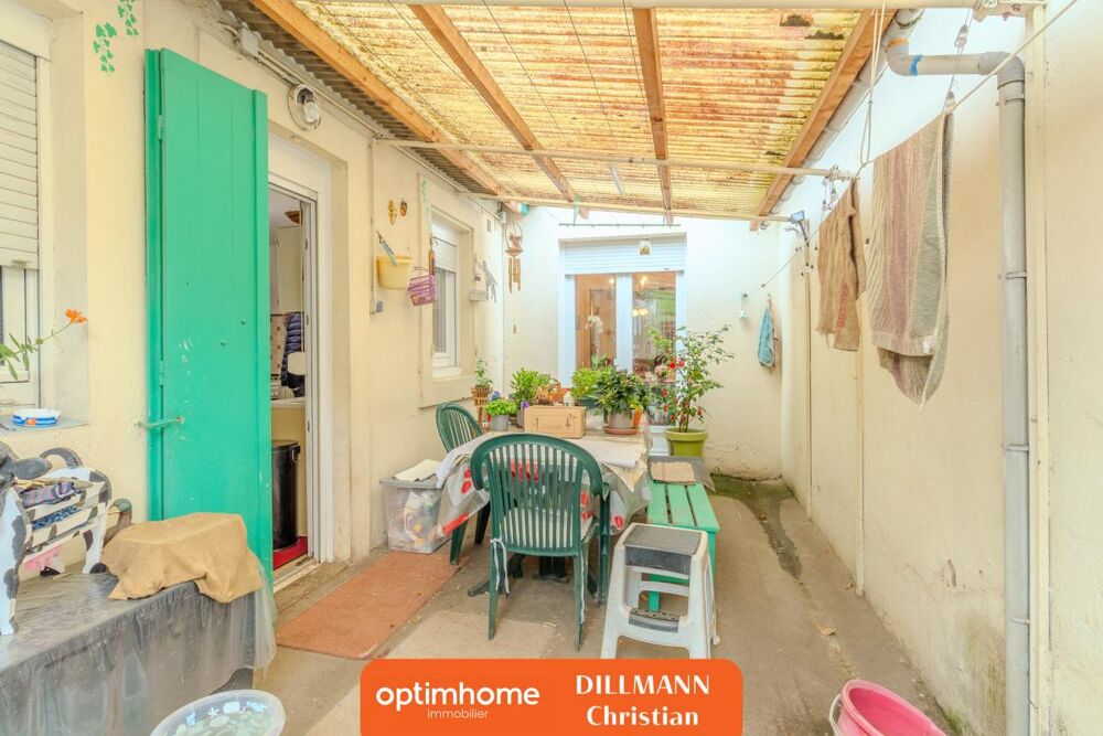 Maison jumelée avec Garage et Jardin
