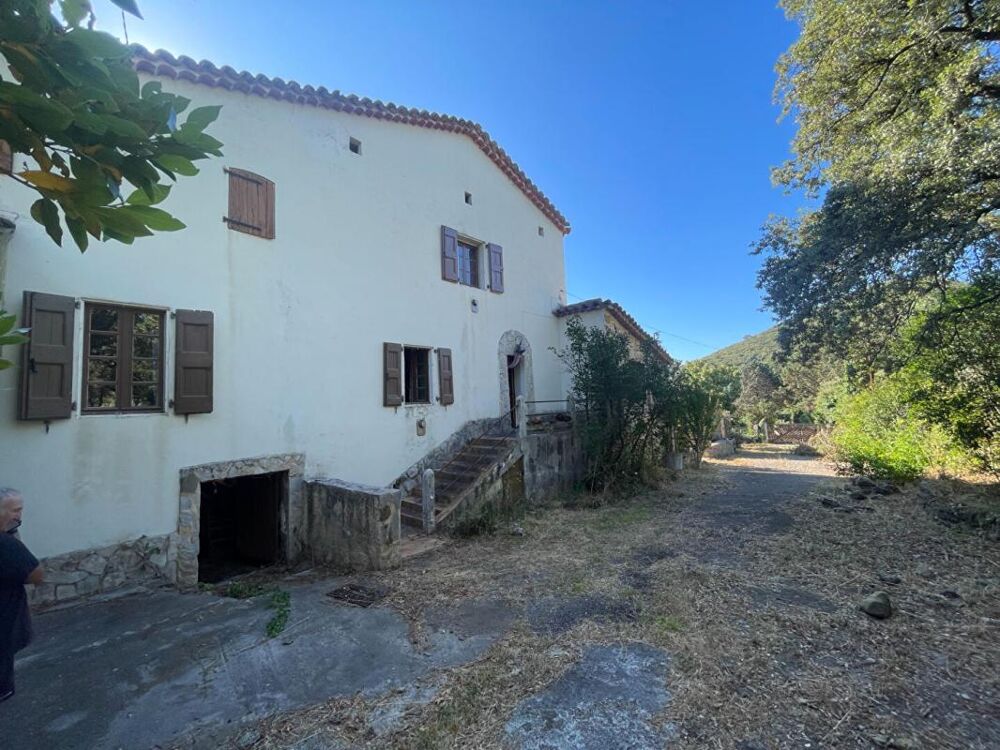 Mas en pierres mitoyen proche Anduze sur terrain constructible de 3300 m2