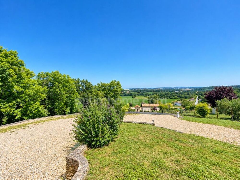 Maison de caractère 5 pièces avec jardin, piscine et garage à DOUZAINS (47330)