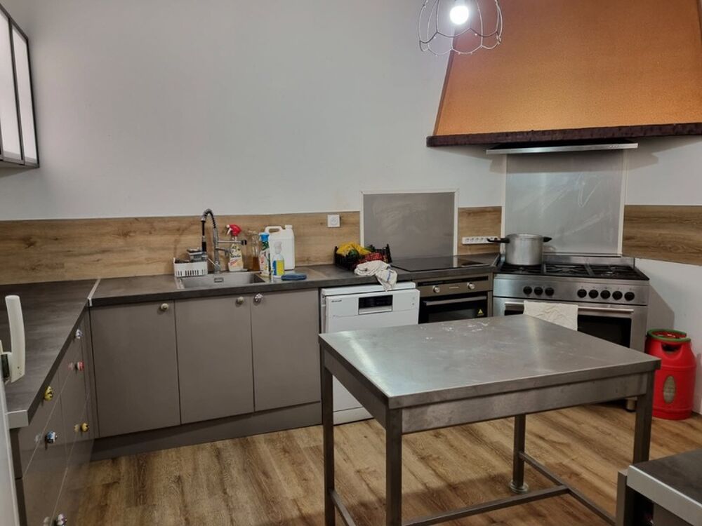 Vente Immeuble GUEMENE SUR SCORFF IMMEUBLE DE 239M� ENVIRON COMPOS� DE DEUX APPARTEMENTS ET UNE SURFACE COMMERCIALE PARCELLE DE 533m� Guemene sur scorff