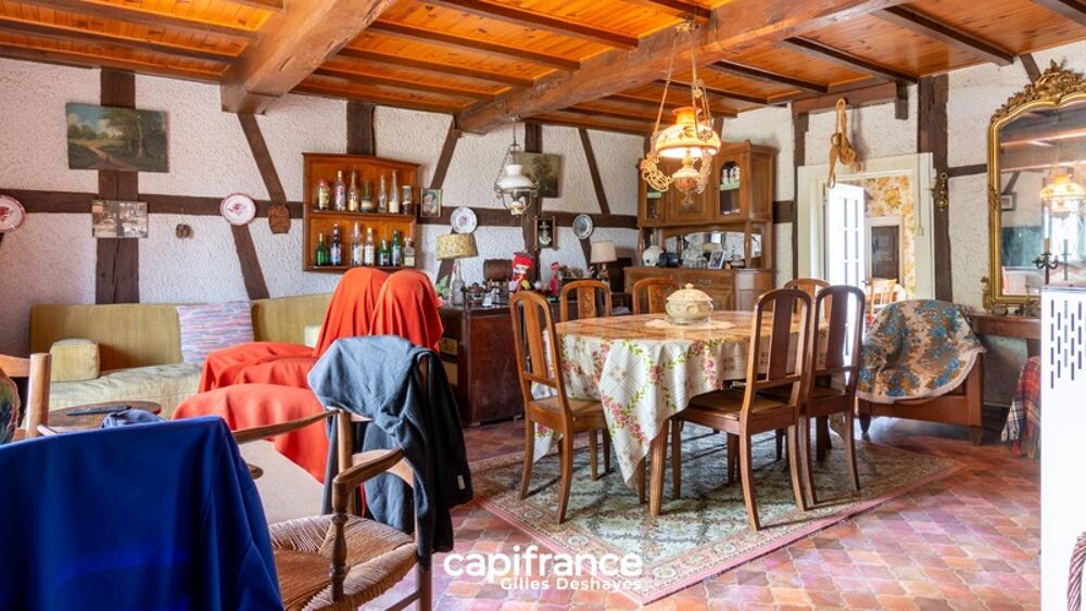 Vente Maison Beaupont (01270), maison bressane de plain-pied à colombages d'environ 94 m² habitables, sur un terrain d'environ 1 161 m², avec Marboz