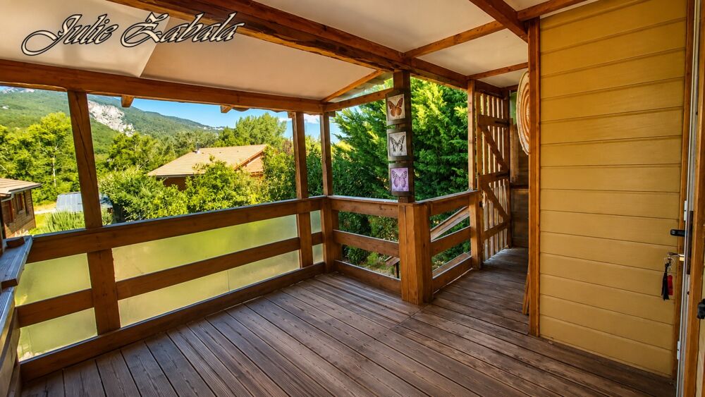 Bungalow en bois avec terrain privatif, terrasse et cave  PRL