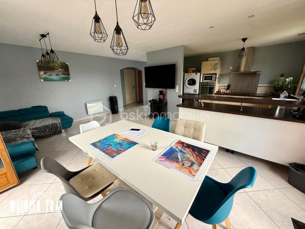 Chaleureuse maison à vendre dans un cadre enchanteur