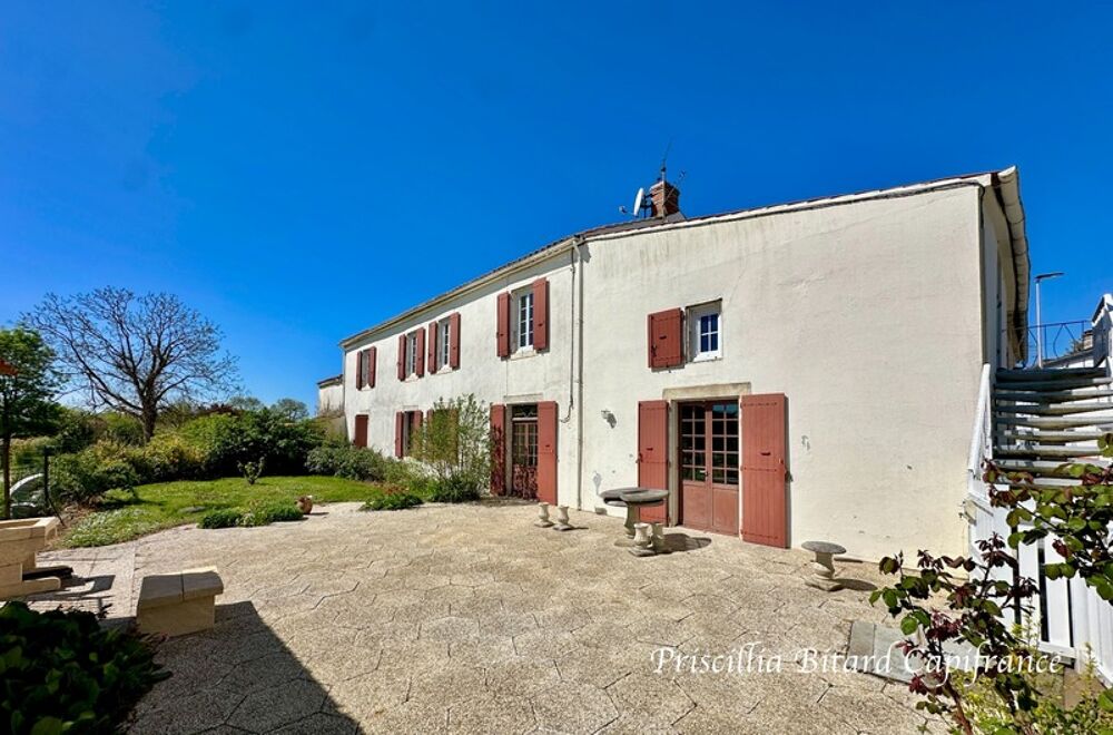 Grande maison familiale avec dépendances et fort potentiel d'aménagement