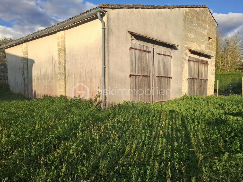 Maison en pierre à rénover  190 m²  Terrain 594 m²  Centre de Saint-Magne-de-Castillon