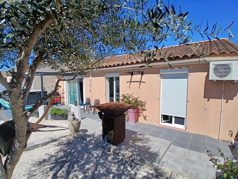 Maison plain-pied 4 chambres avec terrasse et jardin