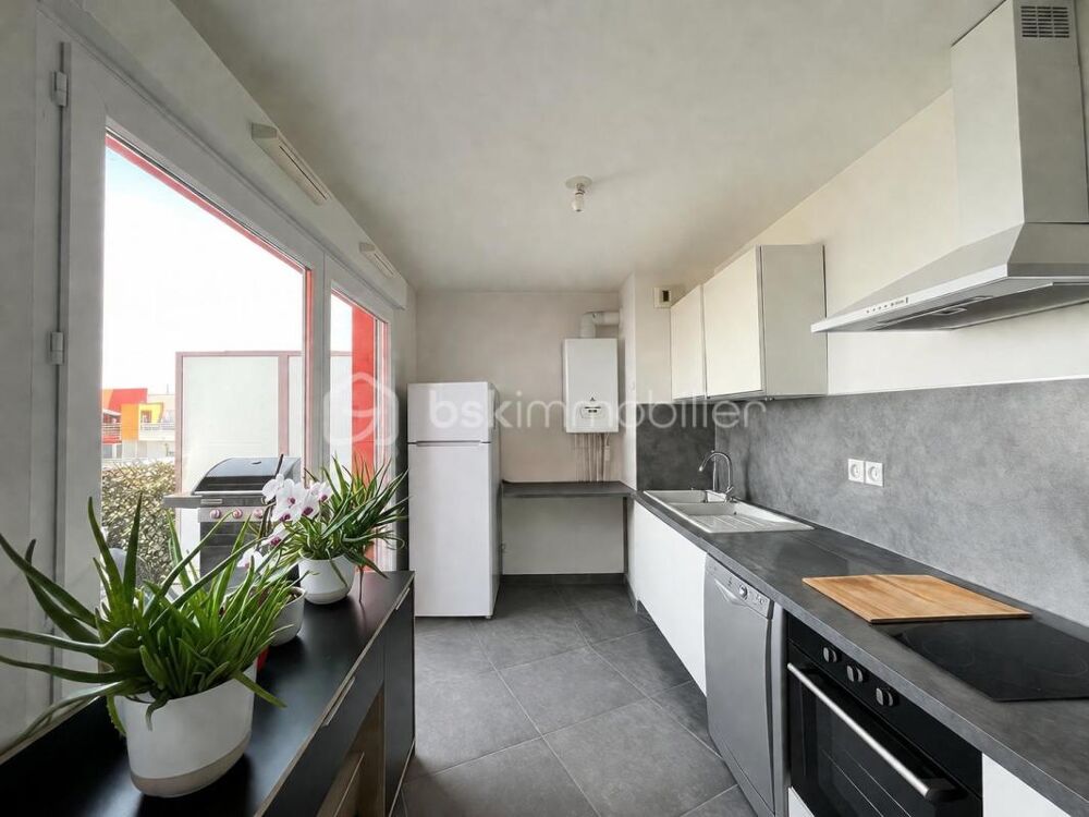 Chevigny : Appartement 3 pièces de 64m² dernier étage/terrasse avec garage et piscine