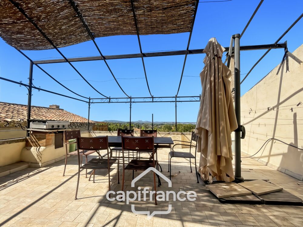 ne demeure de caractère au coeur de la Provence : 242 m2 de superficie habitable , une TERRASSE PANORAMIQUE. Distribution sur 3