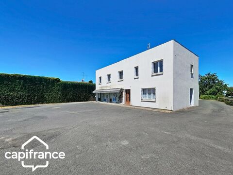   Local d'activité 260 m² + logement 132 m² – parking privé – terrain 1 690 m² – forte visibilité – Thouars (79100) 