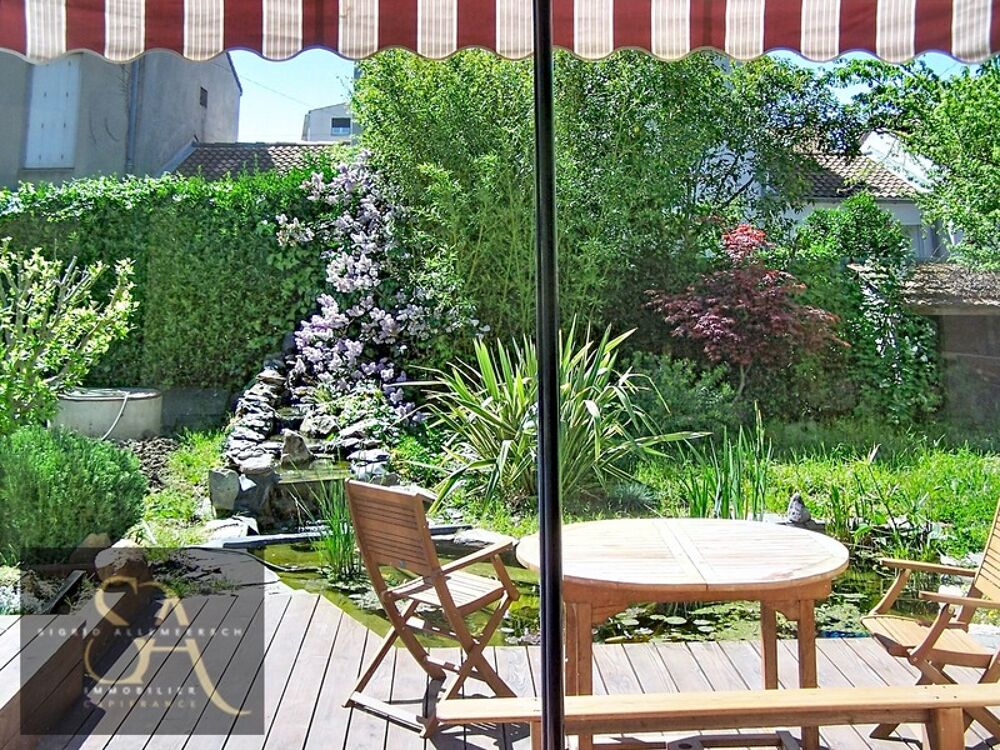 A vendre maison avec 3 chambres, un bureau, garage et jardin à Carcassonne proche des commodités